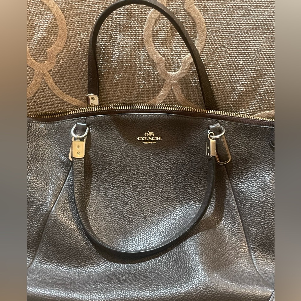 Used coach bag/purse. Fairly clean.